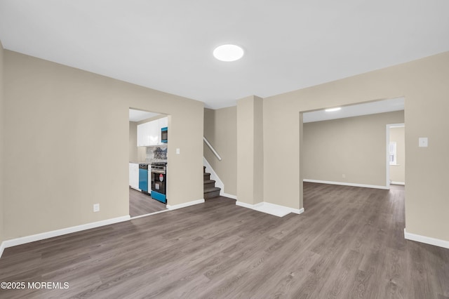 spare room with hardwood / wood-style floors