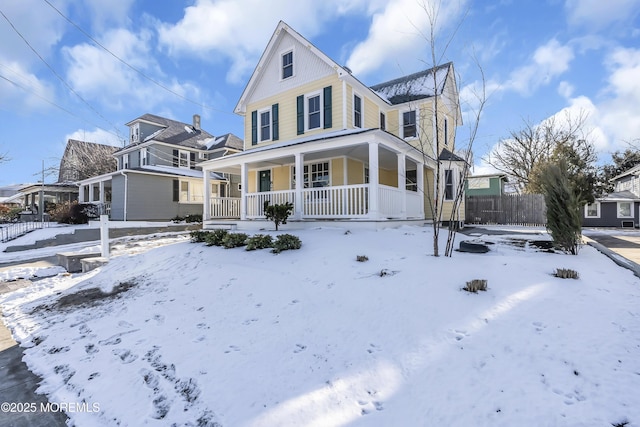 view of front of property featuring covered porch