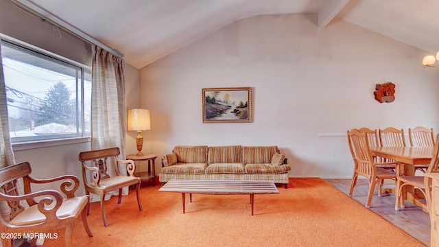 living area featuring vaulted ceiling with beams and baseboards