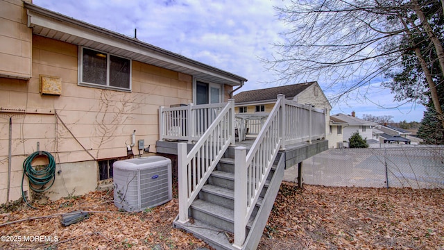 exterior space featuring a deck and central AC unit