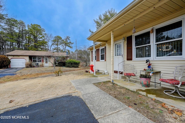 exterior space featuring a garage