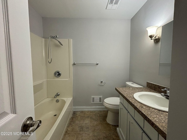 full bathroom featuring vanity, tile patterned flooring, toilet, and shower / bath combination