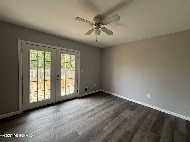 unfurnished room featuring french doors, ceiling fan, and hardwood / wood-style flooring