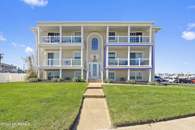 view of front of house with a front lawn