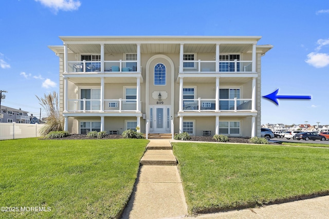 view of front of home with a front lawn