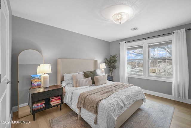 bedroom featuring light hardwood / wood-style flooring