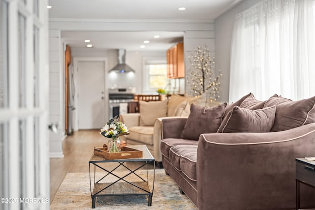 living room featuring recessed lighting and light wood finished floors