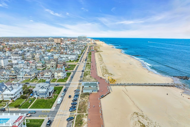 aerial view with a view of the beach and a water view