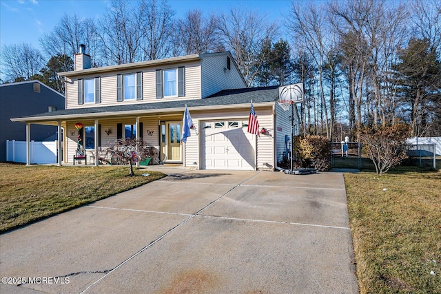 view of front property featuring a porch, a garage, and a front lawn