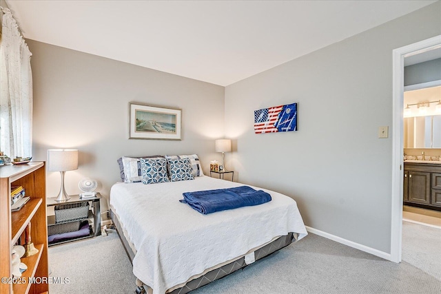 carpeted bedroom with sink