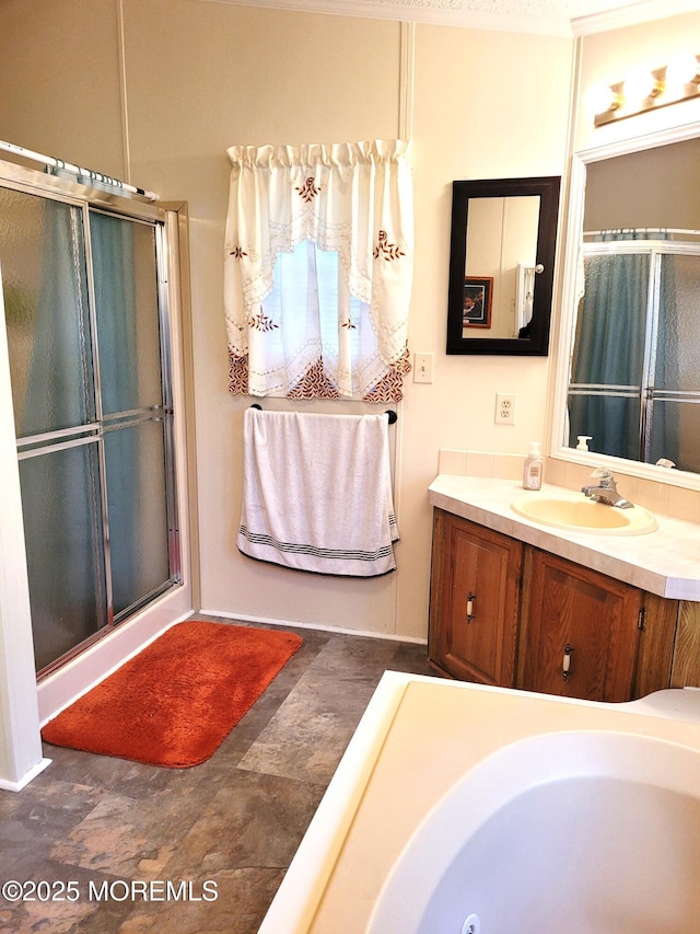 bathroom featuring walk in shower and vanity