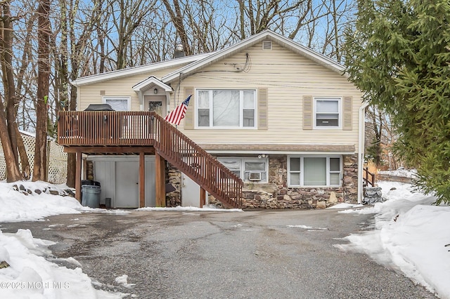 view of front of home with a wooden deck