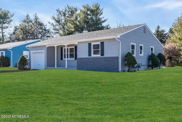 ranch-style house featuring a garage, covered porch, and a front yard