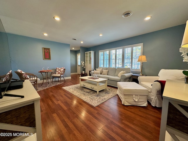 living room featuring dark hardwood / wood-style floors