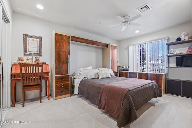 bedroom with recessed lighting, visible vents, ceiling fan, and light colored carpet