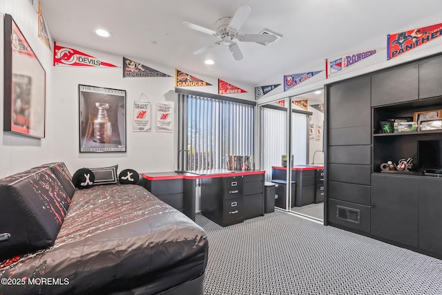 carpeted bedroom with visible vents, a ceiling fan, and recessed lighting