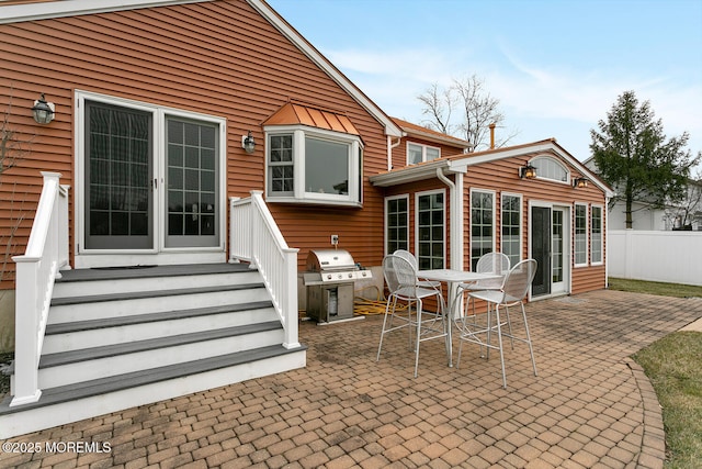 back of house with a patio area