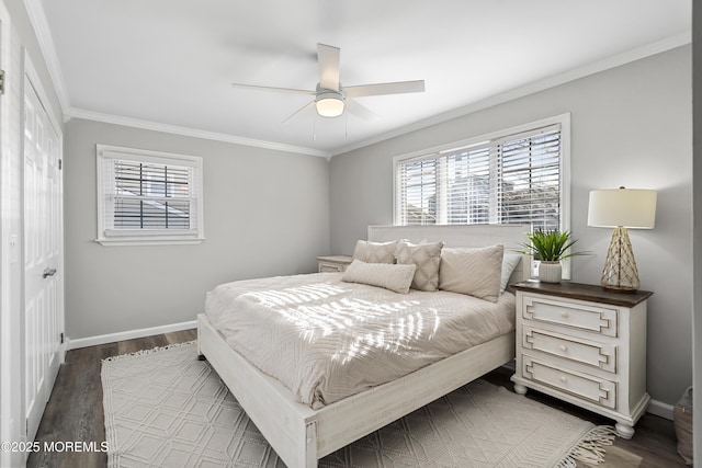 bedroom with dark wood finished floors, a ceiling fan, baseboards, and ornamental molding