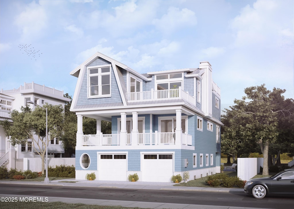 view of front facade featuring a balcony and a garage