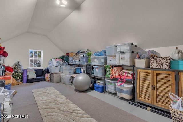 recreation room featuring lofted ceiling