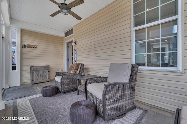 view of patio / terrace featuring a ceiling fan