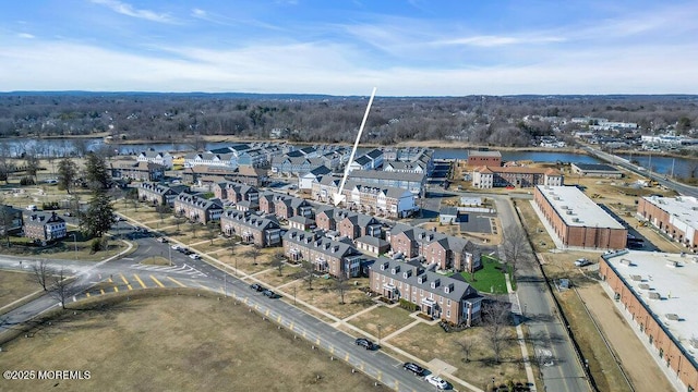 drone / aerial view featuring a water view