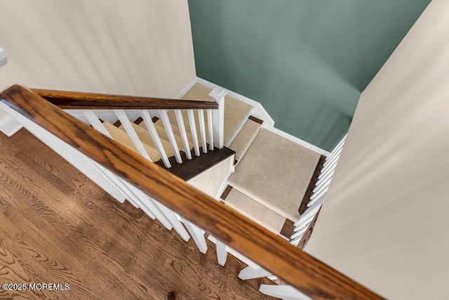 stairway featuring baseboards