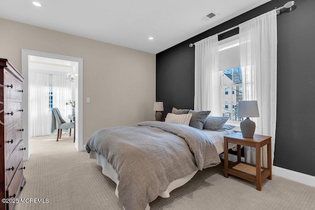 bedroom with light carpet, baseboards, and recessed lighting