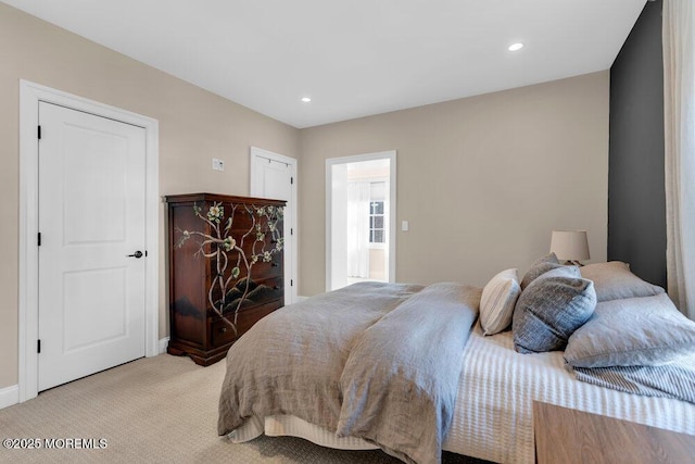 bedroom with light carpet, baseboards, and recessed lighting