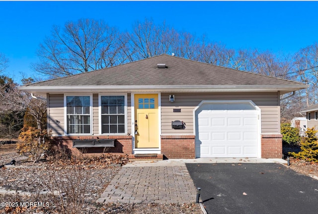 single story home with a garage