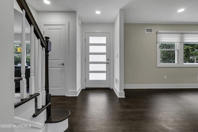 foyer featuring dark hardwood / wood-style floors