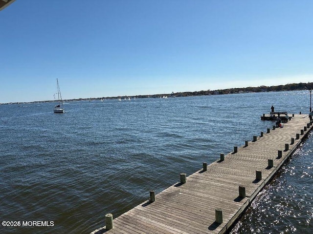 view of dock featuring a water view