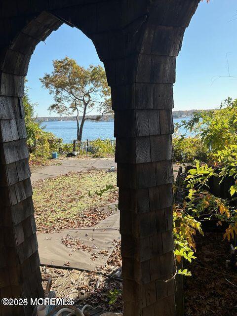 view of yard with a water view