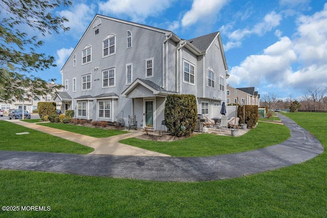 view of front of house with a front lawn