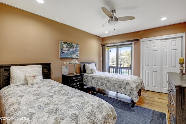 bedroom featuring light hardwood / wood-style flooring, access to outside, a closet, and ceiling fan