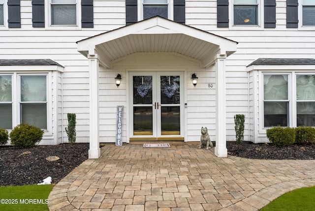 entrance to property featuring french doors