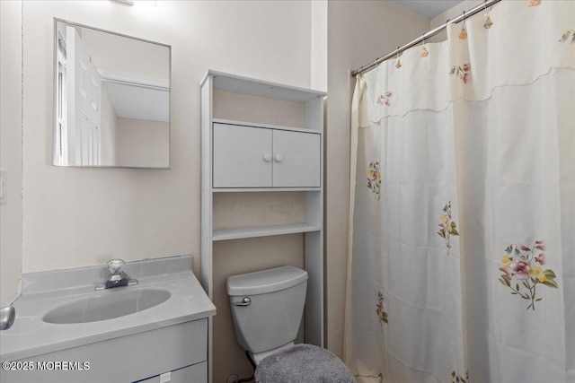 full bath with vanity and toilet