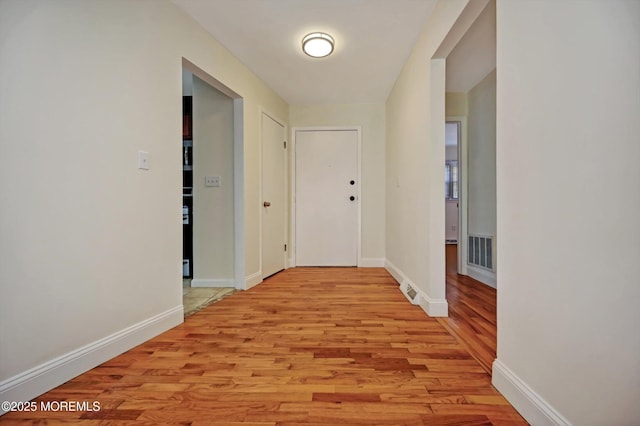 hall featuring light wood-type flooring