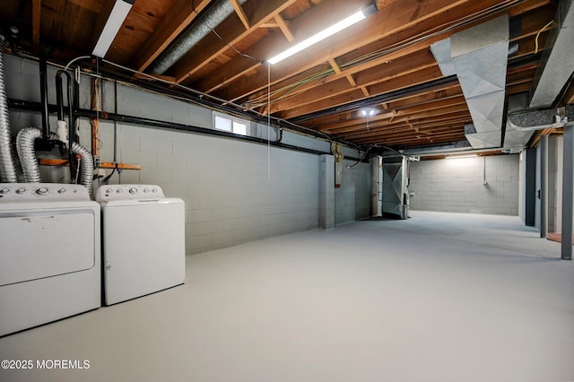 basement featuring separate washer and dryer