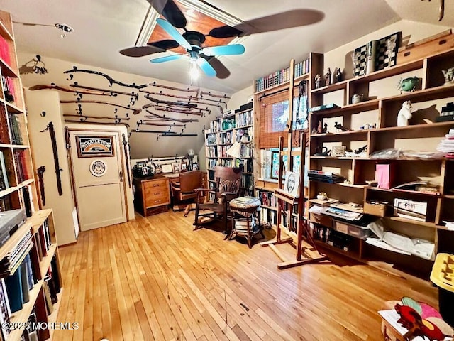 office space featuring ceiling fan and light hardwood / wood-style flooring