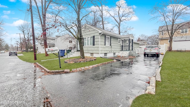 view of property exterior with a yard