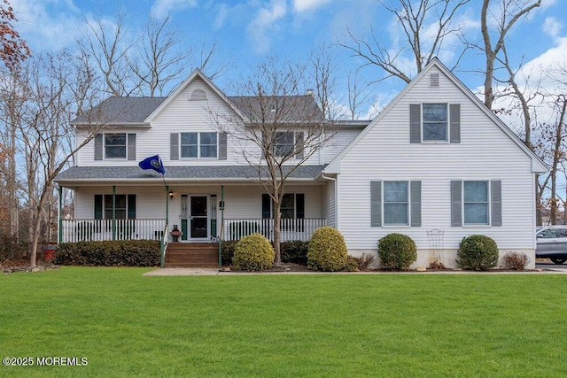 view of front of house with a front lawn and a porch