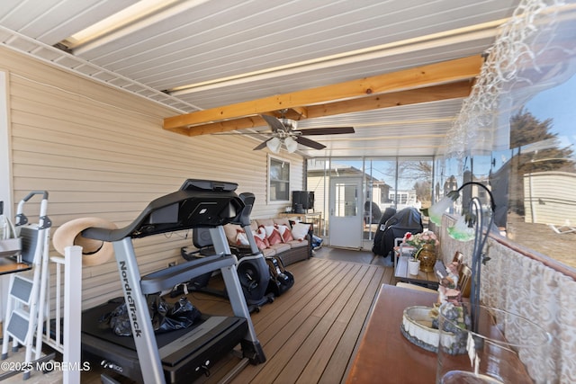 workout area featuring ceiling fan and wood-type flooring