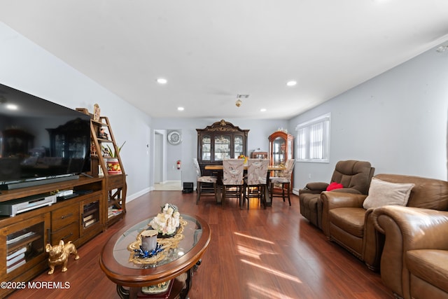 living room with dark wood-type flooring