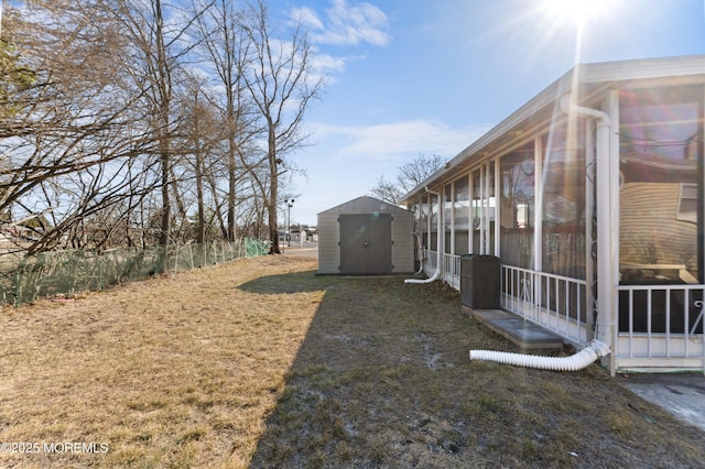 view of yard with a storage shed