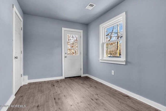 entryway with light hardwood / wood-style flooring