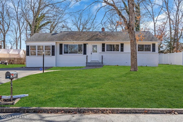 single story home with a front yard