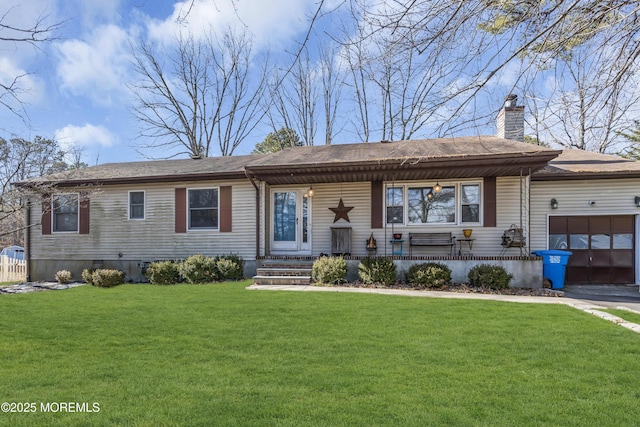 ranch-style house featuring an attached garage, a chimney, a porch, and a front yard