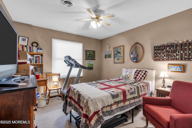 bedroom featuring light colored carpet, visible vents, ceiling fan, and a baseboard radiator