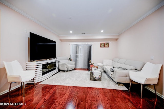 living room with ornamental molding and hardwood / wood-style floors